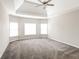 Spacious bedroom featuring neutral walls, plush carpet, ample windows, and a modern ceiling fan at 364 Valleyside Dr, Dallas, GA 30157