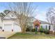 Charming home featuring a brick archway, manicured landscaping and a two-car garage at 364 Valleyside Dr, Dallas, GA 30157