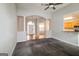 Living room with an open layout that leads into an entryway and dining area at 364 Valleyside Dr, Dallas, GA 30157