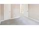 Bedroom showcasing new carpeting with a bathroom entrance at 3396 Framingham Dr, Lithonia, GA 30038