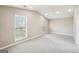 Spacious bedroom with two bright windows and a ceiling fan at 3396 Framingham Dr, Lithonia, GA 30038