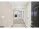 Inviting entryway that opens to the spacious living area with a fireplace at 3396 Framingham Dr, Lithonia, GA 30038