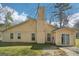 A shot of the back exterior shows the siding, windows and patio door at 3396 Framingham Dr, Lithonia, GA 30038