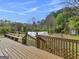 Large back deck overlooking backyard and outbuildings at 1001 Stagecoach Rd, Stockbridge, GA 30281