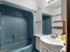 Bathroom featuring a bathtub with shower, single sink vanity, and recessed lighting at 1001 Stagecoach Rd, Stockbridge, GA 30281