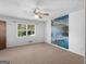A carpeted bedroom with a scenic mountain view mural at 1001 Stagecoach Rd, Stockbridge, GA 30281