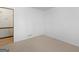 Small bedroom with neutral carpet, minimal decor, and an air conditioning vent at 1001 Stagecoach Rd, Stockbridge, GA 30281