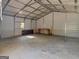 Large empty garage with lots of space at 1001 Stagecoach Rd, Stockbridge, GA 30281