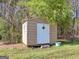 Exterior view of a shed with a light-colored door at 1001 Stagecoach Rd, Stockbridge, GA 30281