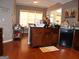 Features a granite countertop island, wood cabinets and stainless steel dishwasher at 185 Ridgewood Dr, Fayetteville, GA 30215