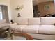 Cozy living room featuring comfortable sofas, decorative art, and neutral decor at 185 Ridgewood Dr, Fayetteville, GA 30215