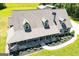 Birds eye view of the home with well-maintained landscaping and a covered front porch and matching detached garage at 640 Lovell Rd, Temple, GA 30179