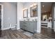 Bright bathroom with granite countertops, double sinks, and tiled floors at 640 Lovell Rd, Temple, GA 30179