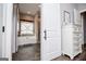 Modern bathroom with a soaker tub and tile floors, plus a sliding barn door feature at 640 Lovell Rd, Temple, GA 30179