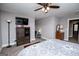 Bedroom features neutral paint, ceiling fan, and carpeted floors at 640 Lovell Rd, Temple, GA 30179