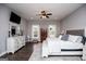 Spacious bedroom features hardwood floors, ceiling fan, and window views at 640 Lovell Rd, Temple, GA 30179