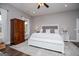 Spacious bedroom features hardwood floors, ceiling fan, and window views at 640 Lovell Rd, Temple, GA 30179