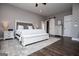 Spacious bedroom features hardwood floors, ceiling fan, and dresser at 640 Lovell Rd, Temple, GA 30179