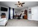 Spacious bedroom with gray walls, ceiling fan, carpeted floors, desk area and natural light at 640 Lovell Rd, Temple, GA 30179