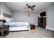 Bedroom features neutral paint, ceiling fan, and carpeted floors at 640 Lovell Rd, Temple, GA 30179