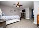 Spacious bedroom features neutral paint, ceiling fan, and carpeted floors at 640 Lovell Rd, Temple, GA 30179