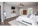 Spacious bedroom features hardwood floors, ceiling fan, and window views at 640 Lovell Rd, Temple, GA 30179