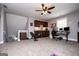 Spacious room featuring kitchenette, exercise space, and gray carpeted floors at 640 Lovell Rd, Temple, GA 30179