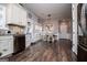 Open dining area with hardwood floors and white table and chairs at 640 Lovell Rd, Temple, GA 30179