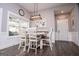 Bright dining room featuring a stylish table and chairs with plenty of natural light at 640 Lovell Rd, Temple, GA 30179