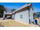Exterior of home featuring a covered patio, exposed air conditioning unit, and a satellite dish at 640 Lovell Rd, Temple, GA 30179