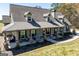 Inviting covered front porch with stone pillars offers a relaxing outdoor space at 640 Lovell Rd, Temple, GA 30179