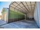 Inside of this large garage are three sections for ample vehicle storage at 640 Lovell Rd, Temple, GA 30179