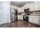 Well-equipped kitchen with stainless steel appliances and ample cabinet space at 640 Lovell Rd, Temple, GA 30179