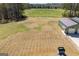 A beautiful parcel of land and outbuilding showcasing natural beauty and functionality at 640 Lovell Rd, Temple, GA 30179