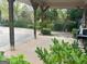 Covered back patio with concrete flooring and grill, perfect for entertaining at 227 Fenwick Cir, Mcdonough, GA 30253