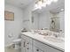 Bright bathroom with double vanity, modern lighting, and neutral decor at 813 Royal Red Ct, Mcdonough, GA 30253