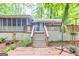 Multi-level wooden back deck and yard at 346 Buckingham Sw Dr, Conyers, GA 30094