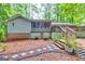 Backyard multi-level deck and stairs at 346 Buckingham Sw Dr, Conyers, GA 30094