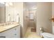 Bright bathroom features white vanity, and a shower-tub combo at 346 Buckingham Sw Dr, Conyers, GA 30094