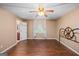 Bedroom with hardwood floors, neutral paint, ceiling fan, and natural light at 346 Buckingham Sw Dr, Conyers, GA 30094
