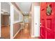 Bright foyer with hardwood floors and a view into the living spaces, highlighting the home's open design at 346 Buckingham Sw Dr, Conyers, GA 30094