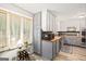 Kitchen featuring stainless steel appliances, butcher block countertops, gray cabinets, and luxury vinyl plank flooring at 346 Buckingham Sw Dr, Conyers, GA 30094