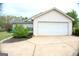 Charming home featuring an attached two-car garage and a well-manicured lawn at 329 Harris Ave, Locust Grove, GA 30248