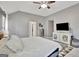 Tranquil primary bedroom with a TV, soft carpet, and doorways to the bathroom and closet at 147 Kripple Kreek Dr, Sharpsburg, GA 30277
