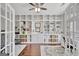 Bright office space with custom built-in bookshelves and hardwood floors at 147 Kripple Kreek Dr, Sharpsburg, GA 30277