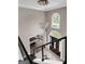 Grand two-story foyer with elegant chandelier, staircase, and view of entry door at 3144 Sherwood Oaks Ln, Decatur, GA 30034