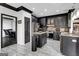 Spacious kitchen featuring dark wood cabinets, granite countertops, an island, and stainless steel appliances at 3144 Sherwood Oaks Ln, Decatur, GA 30034