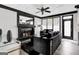 Living room featuring modern decor, fireplace with decorative mantle, hardwood floors, and ample natural light at 3144 Sherwood Oaks Ln, Decatur, GA 30034