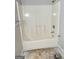 Bathroom featuring a tub and shower combo, awaiting upgrades to enhance appeal and value at 466 Joseph E Lowery Nw Blvd, Atlanta, GA 30314