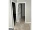 Hallway with doorways, primed for flooring updates to enhance appeal and value at 466 Joseph E Lowery Nw Blvd, Atlanta, GA 30314